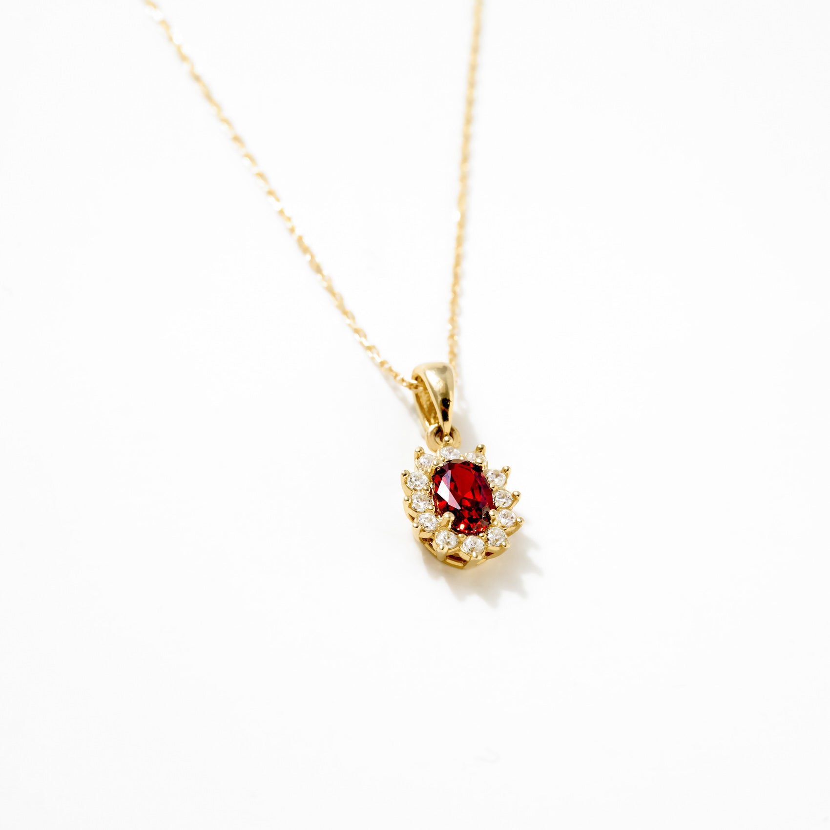 14K Gold Ruby Oval Gemstone Pendant Necklace with White Stone Accents